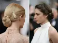 Dos mujeres con peinado elegante y vestido de cuello alto. Una luce un moño bajo con pasadores de perlas, la otra una trenza elaborada.